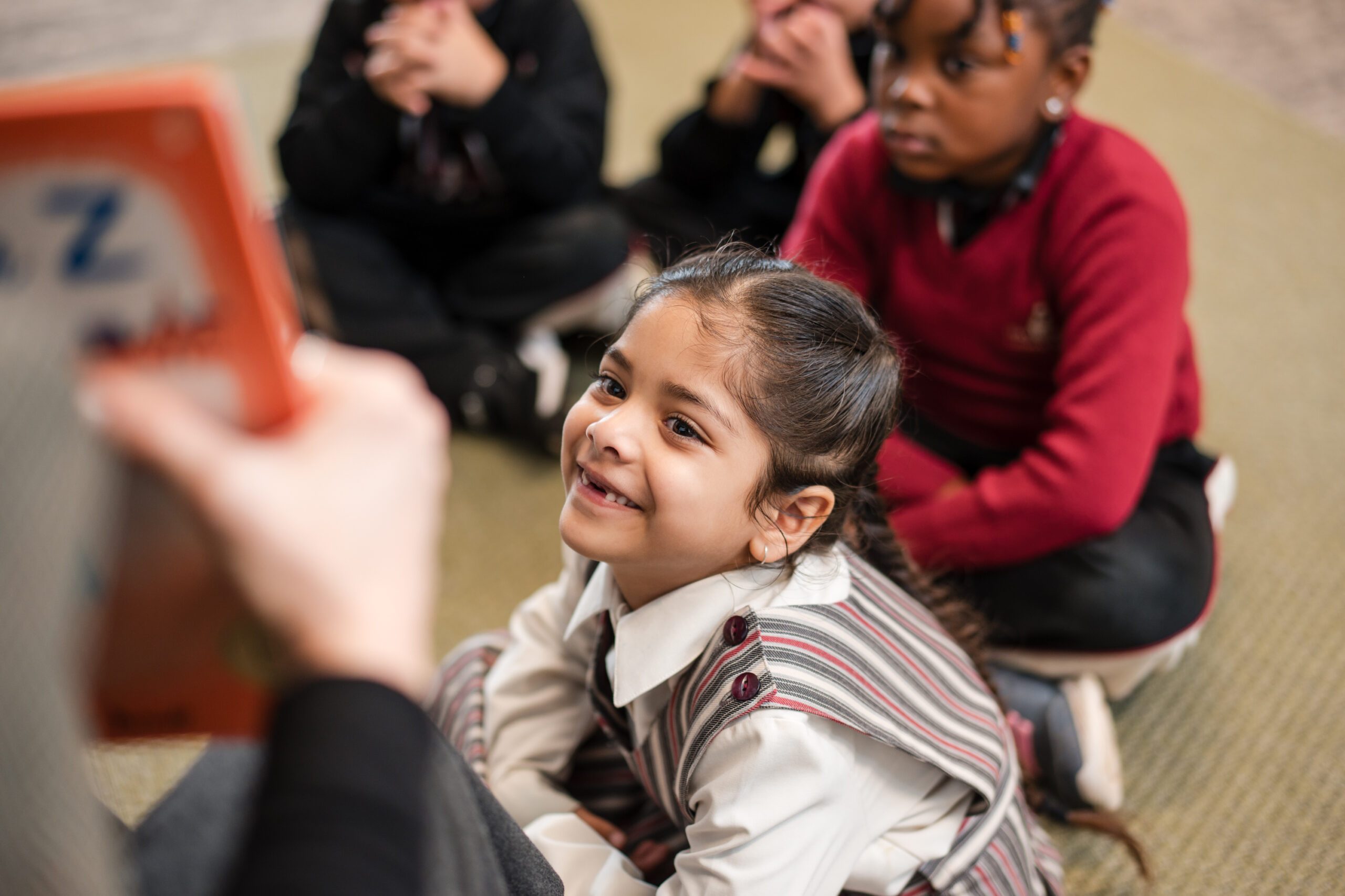 Students engaged in curriculum learning at Holy Family Catholic School